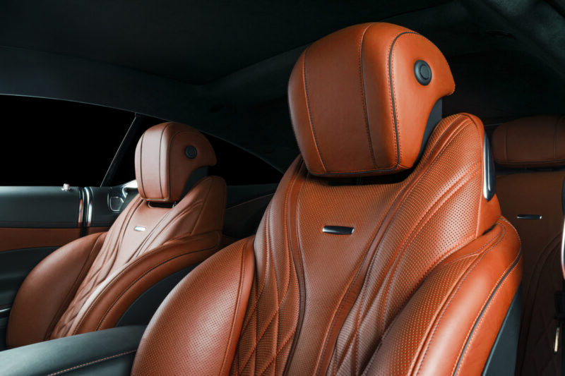 Car inside. Interior of a car. Comfortable leather seats. Perforated leather. Car interior details. Car detailing